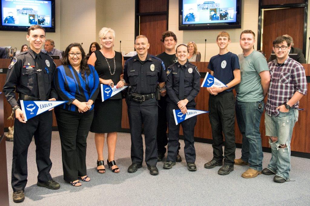 Photo of Cheryl Lieck with members of Barbers Hill Explorers